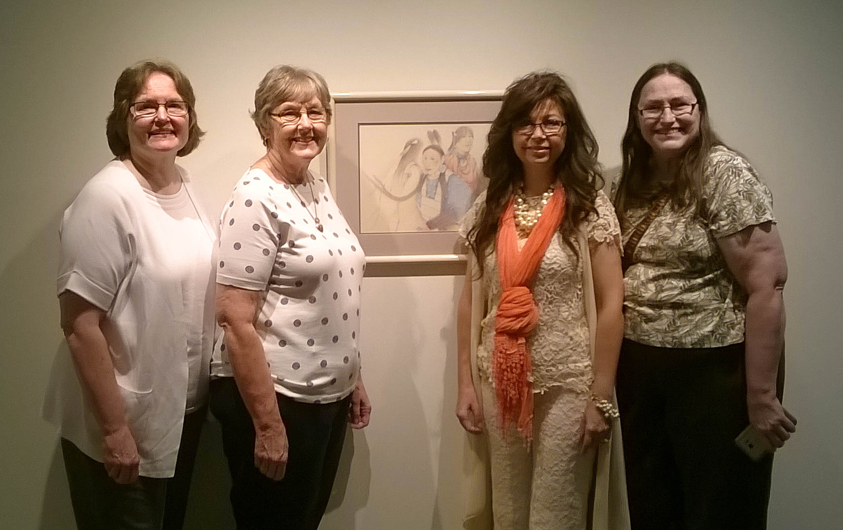 Sisters Dianna Whitehurt, Elizabeth Griffin and Elaine Harman donated an untitled art piece to the Connors State College Ken Ogden Family Museum at the Native American Success and Cultural Center on the Warner Campus. They are pictured with Rebecca Clovis (third from left), Native American Advisor and Cherokee Promise Coordinator, who was instrumental in procuring the art. 