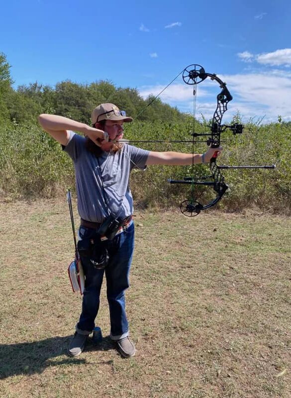 Clayton Porterfield Anchored and aiming at Target with Hunting Bow Setup.
