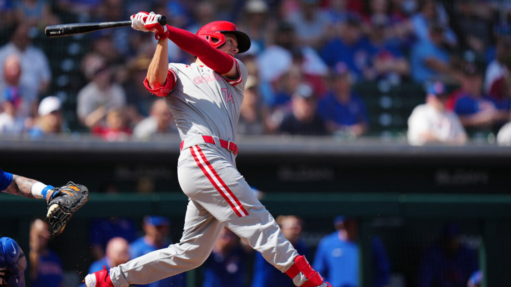 Former Cowboy, Jared Young, swings at a pitch while representing the Canadian National Team in competition. 